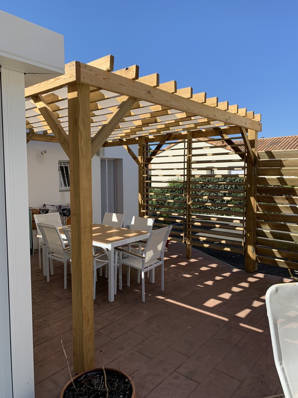 Terrasse sous pergola